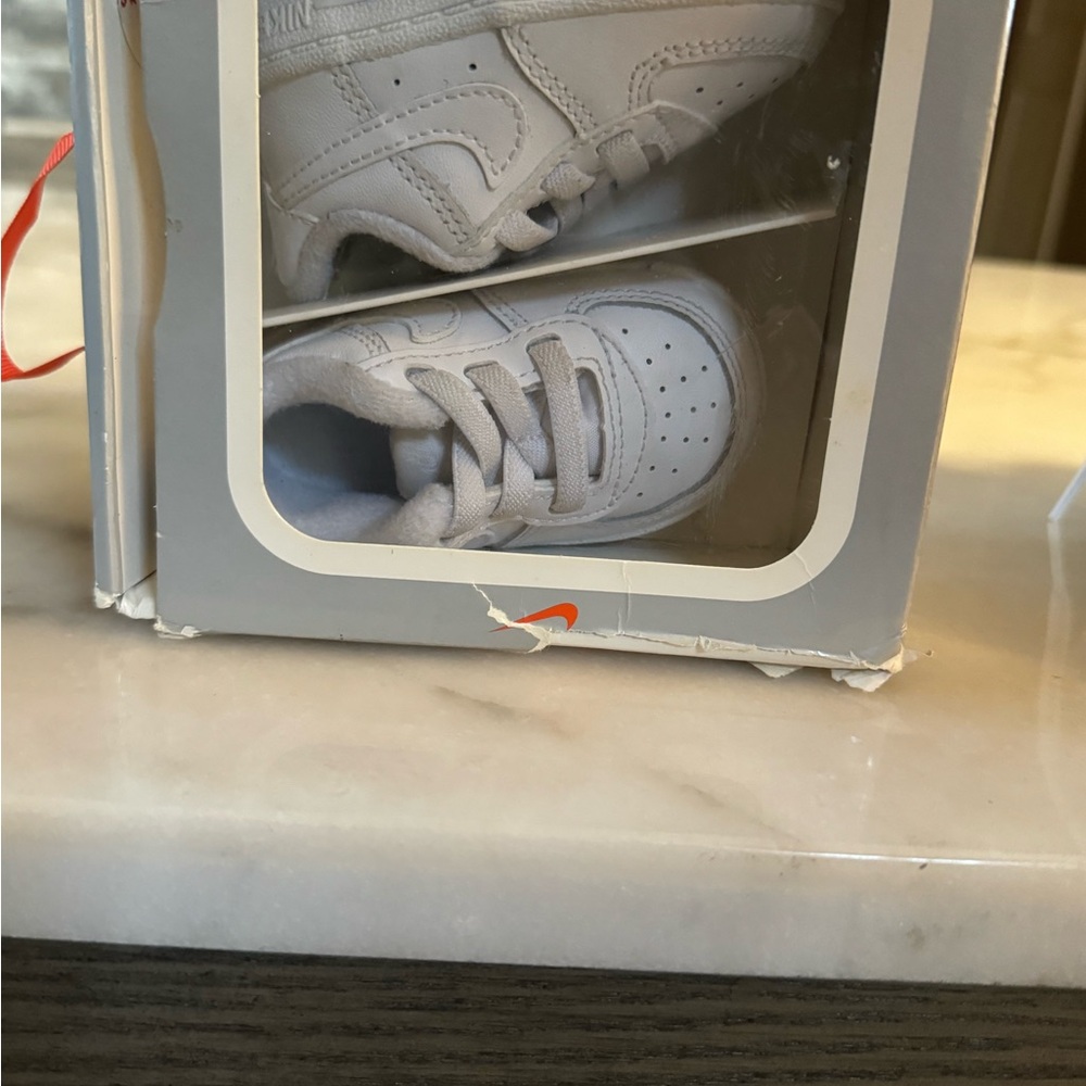 Crib size white Air Force ones size 2